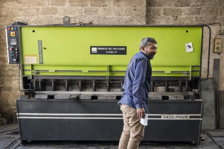 CNC bending support machine and operator inside Jay Safe factory
